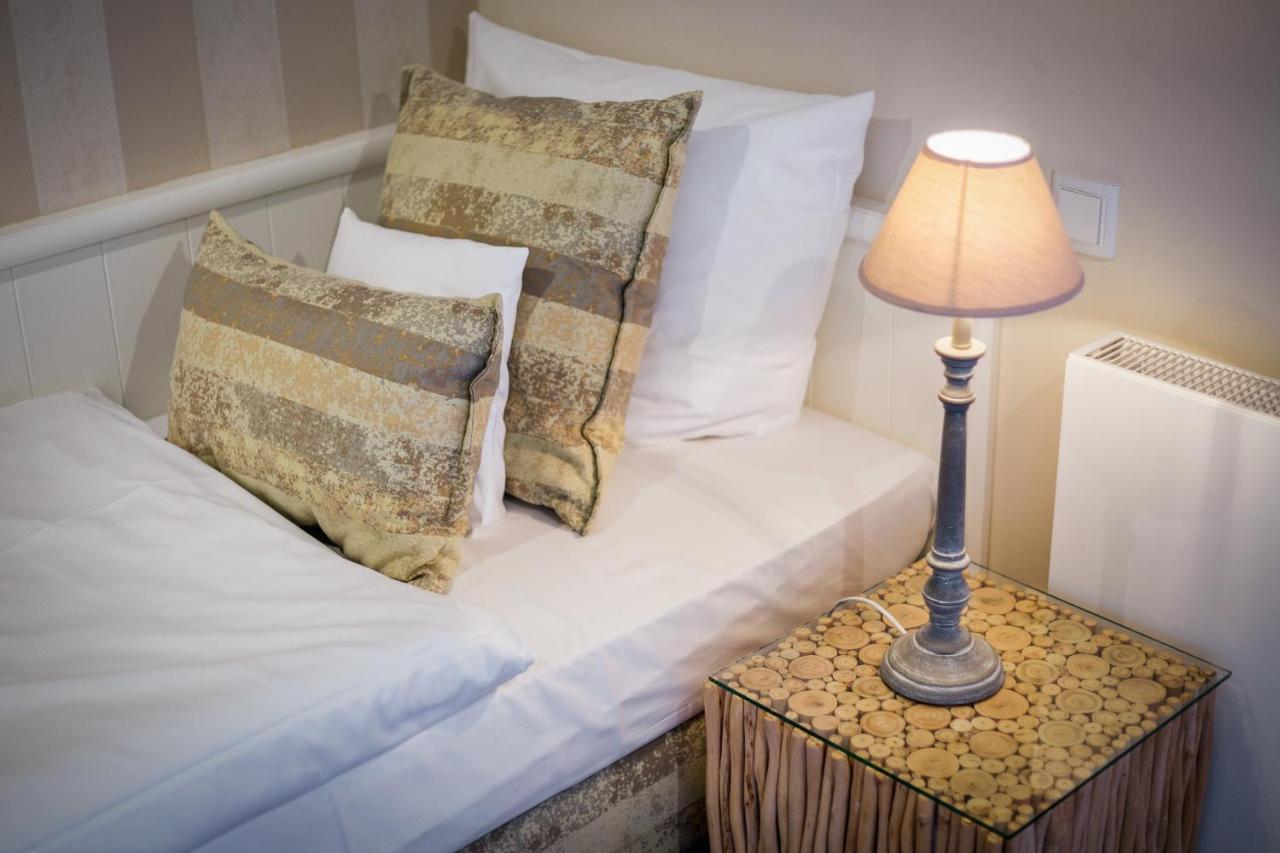 Apartmenthotel Am Leuchtturm Hornum Bagian luar foto