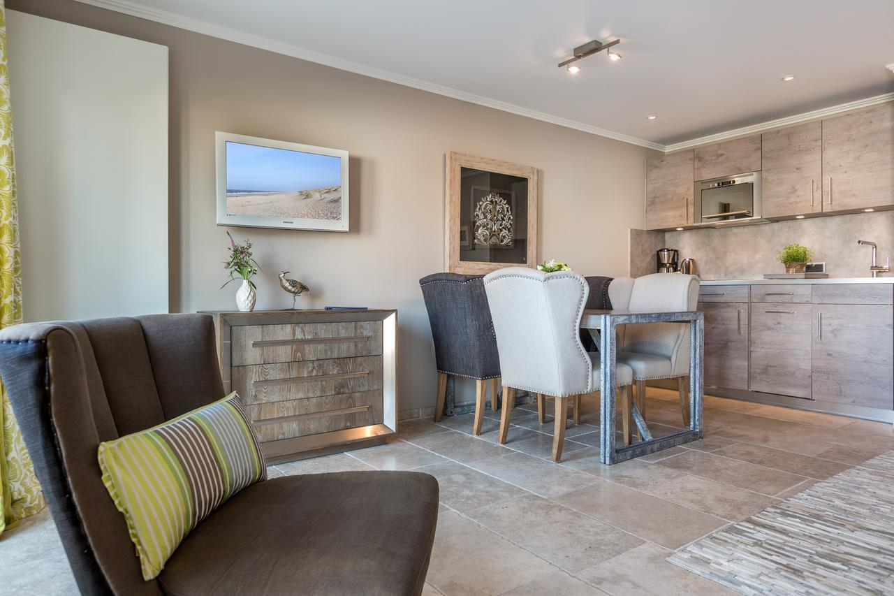 Apartmenthotel Am Leuchtturm Hornum Bagian luar foto