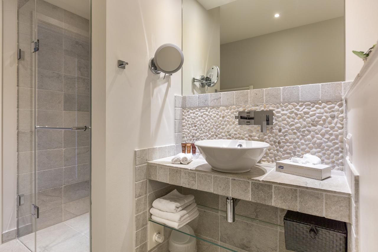 Apartmenthotel Am Leuchtturm Hornum Bagian luar foto