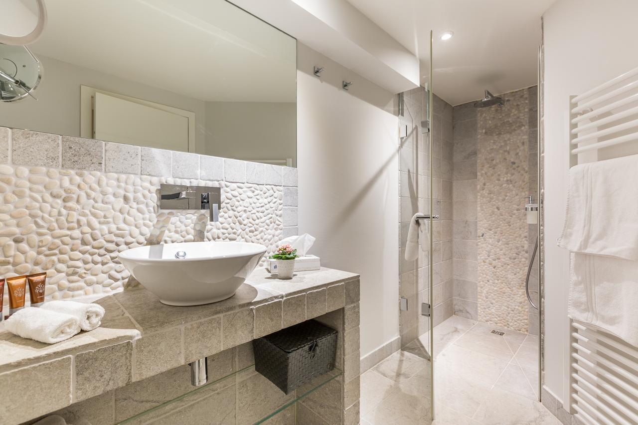 Apartmenthotel Am Leuchtturm Hornum Bagian luar foto