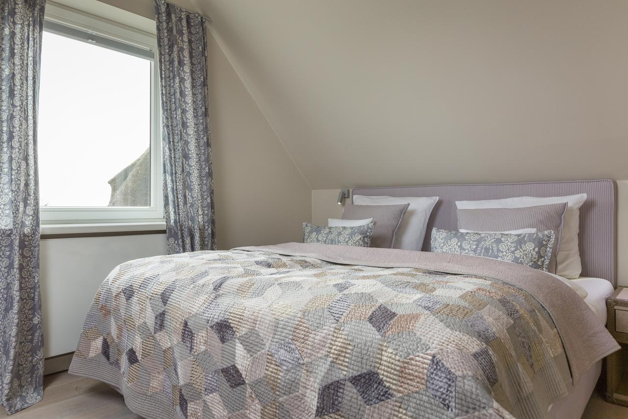 Apartmenthotel Am Leuchtturm Hornum Bagian luar foto