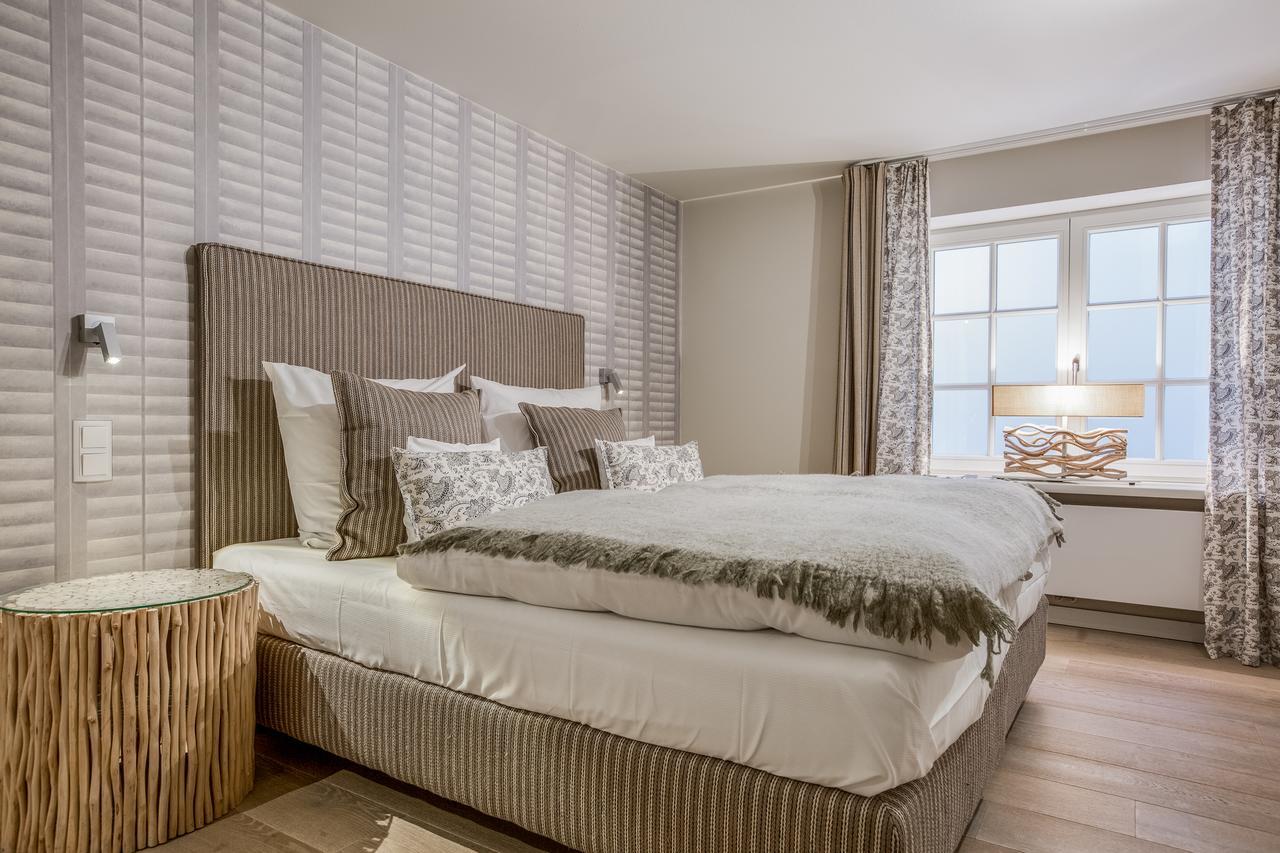Apartmenthotel Am Leuchtturm Hornum Bagian luar foto